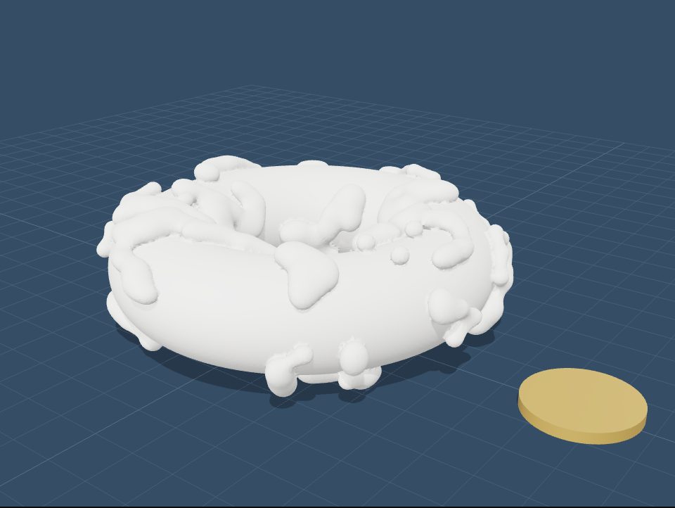 A doughnut covered in raised blobs where cells are alive.